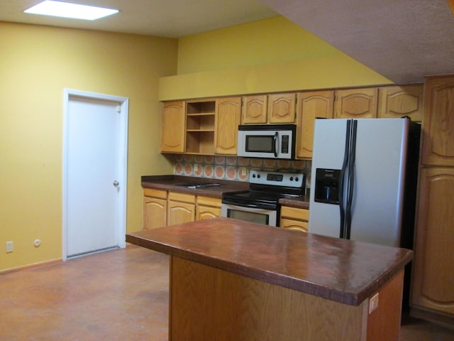 kitchen featuring open shelves, backsplash, dark countertops, a center island, and appliances with stainless steel finishes