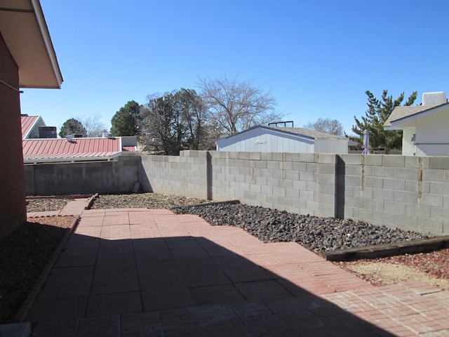 view of patio with a fenced backyard