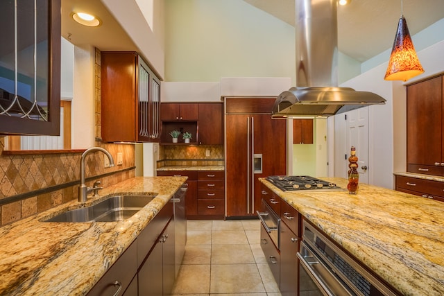 kitchen featuring island exhaust hood, a sink, tasteful backsplash, stainless steel appliances, and light tile patterned flooring