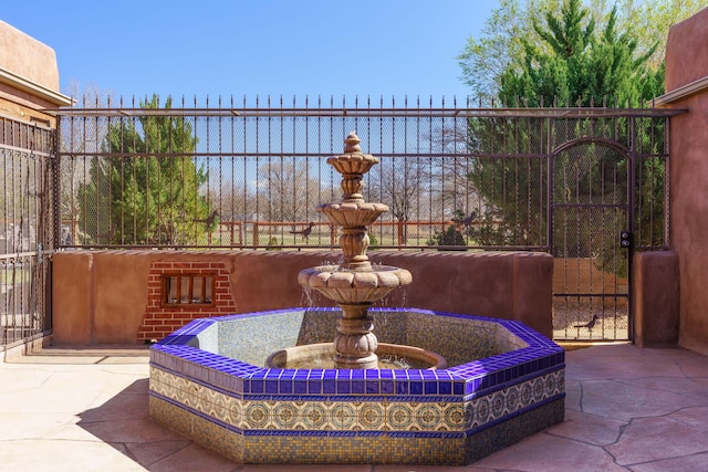 view of patio / terrace featuring a gate