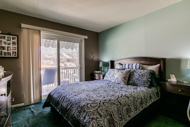 bedroom with carpet and access to outside