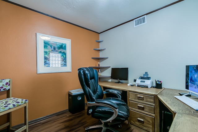 office featuring visible vents, dark wood finished floors, and crown molding