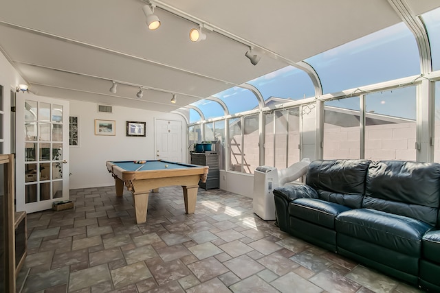 playroom featuring track lighting, billiards, and stone finish floor