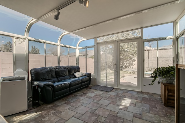 sunroom with rail lighting