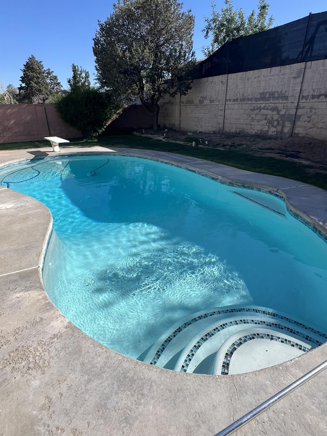 view of pool with a fenced backyard and a fenced in pool