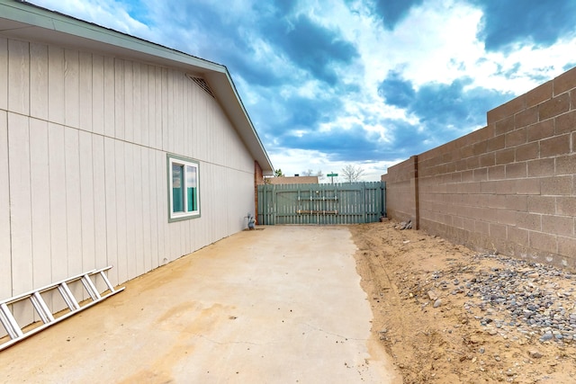 view of yard with a patio and a fenced backyard