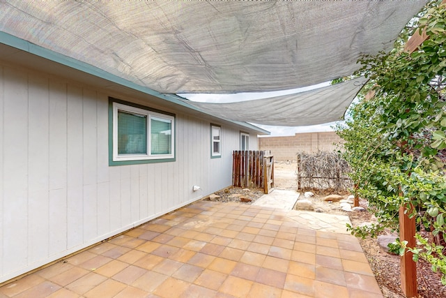 view of patio with fence