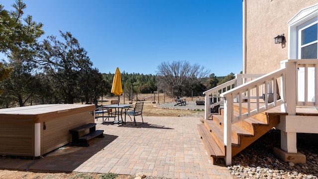 view of patio featuring a hot tub