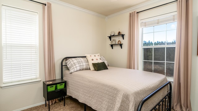 bedroom with baseboards, carpet, and ornamental molding