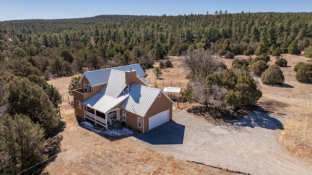 drone / aerial view with a forest view