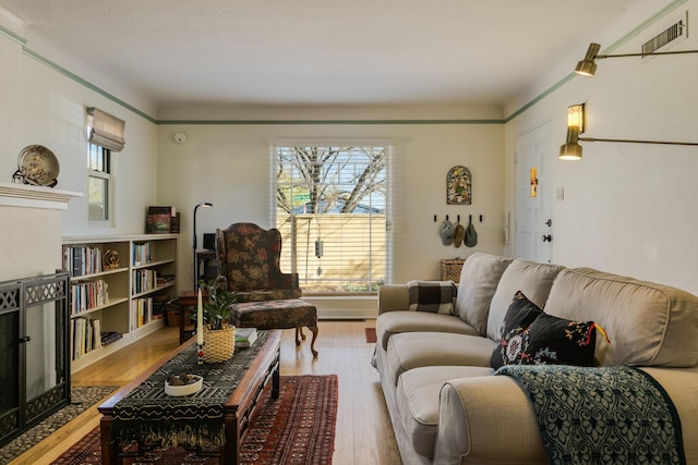 living area with wood finished floors