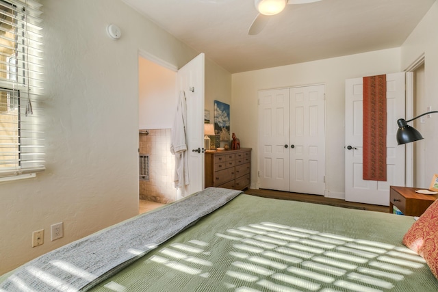 bedroom featuring a closet and a ceiling fan