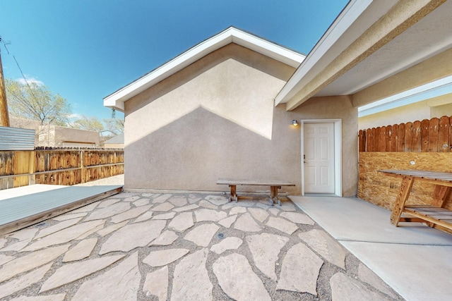 view of patio with fence