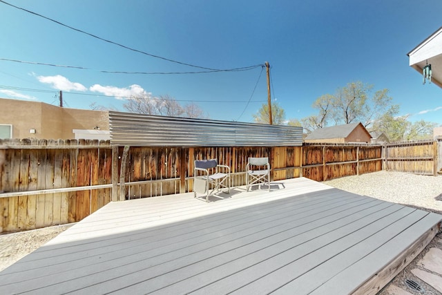 deck featuring a fenced backyard