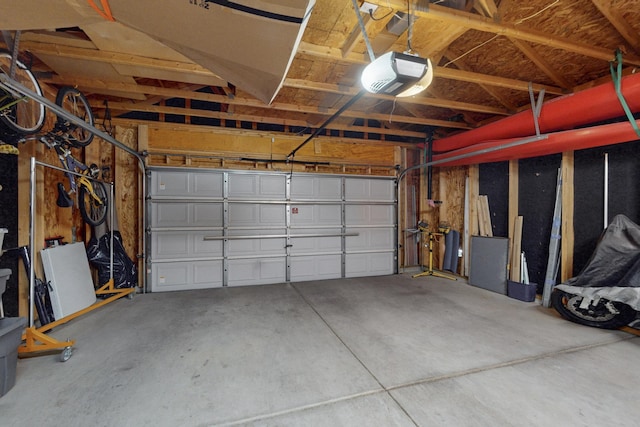 garage featuring a garage door opener