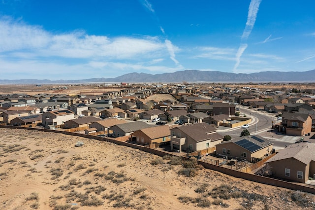 drone / aerial view featuring a mountain view and a residential view