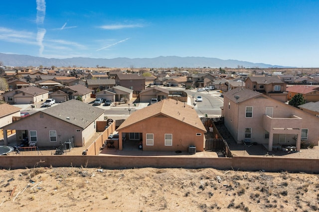 bird's eye view with a mountain view and a residential view