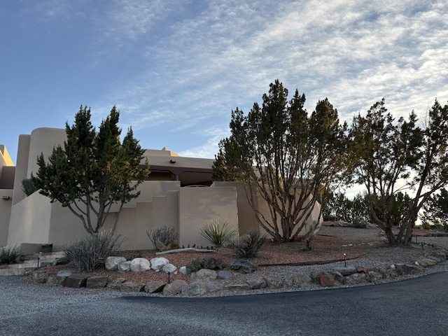 view of home's exterior with stucco siding