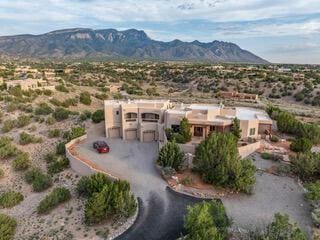 bird's eye view featuring a mountain view and view of desert