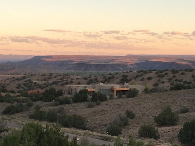 view of mountain feature with a rural view
