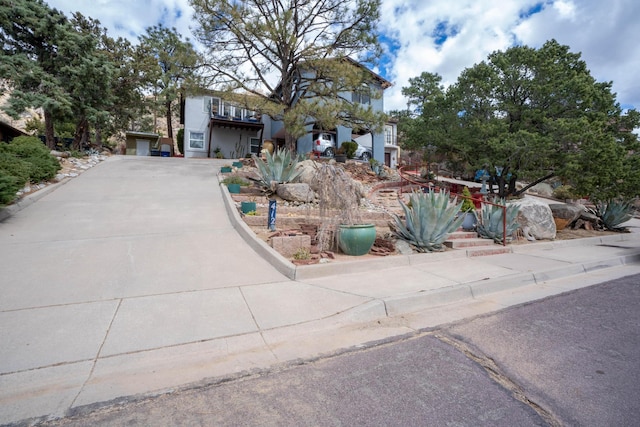 view of front of home featuring driveway and stucco siding