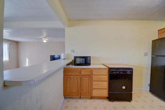 kitchen featuring a ceiling fan, black appliances, light floors, and a textured ceiling