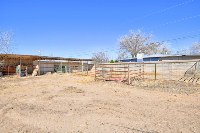 view of yard with an exterior structure and an outbuilding