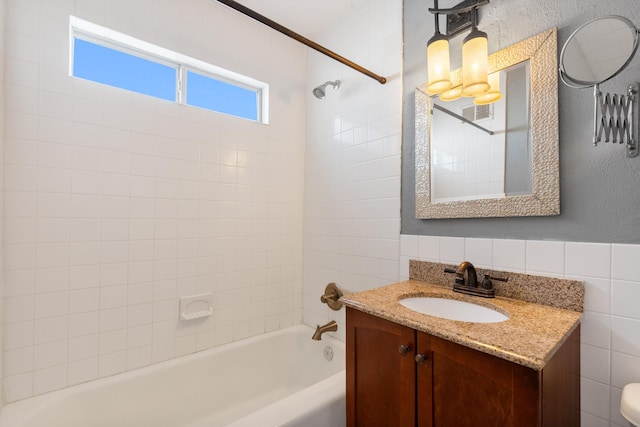 full bath featuring washtub / shower combination and vanity