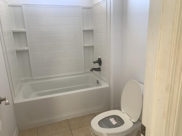 bathroom with tile patterned floors, toilet, and shower / tub combination