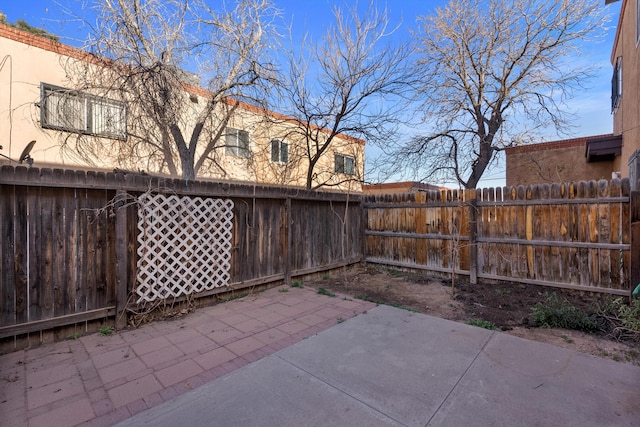 view of patio with a fenced backyard