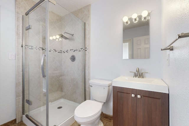 full bath with a shower stall, toilet, and vanity