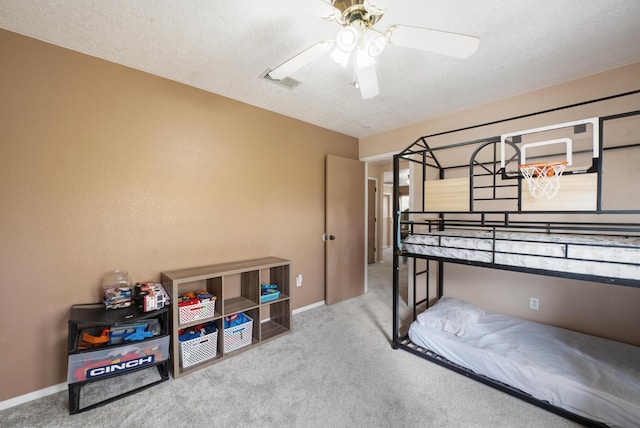 101 Colinas Ave NE, Albuquerque, NM 87113 - carpeted bedroom with visible vents, a textured ceiling, and baseboards