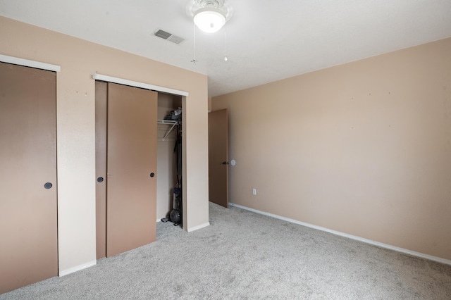 101 Colinas Ave NE, Albuquerque, NM 87113 - unfurnished bedroom featuring visible vents, baseboards, and carpet flooring