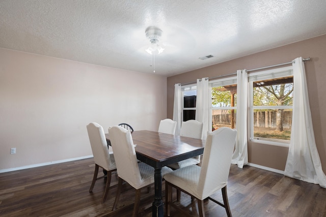 101 Colinas Ave NE, Albuquerque, NM 87113 - dining area with wood finished floors, a ceiling fan, and baseboards
