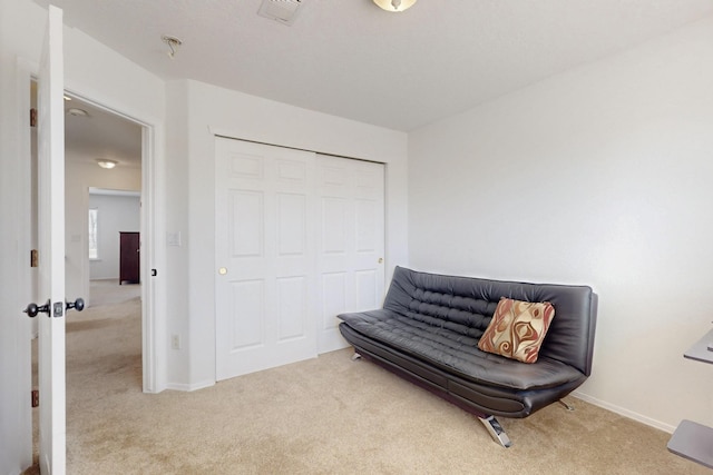 1001 Calle Garza NE, Albuquerque, NM 87113 - sitting room with visible vents, baseboards, and carpet