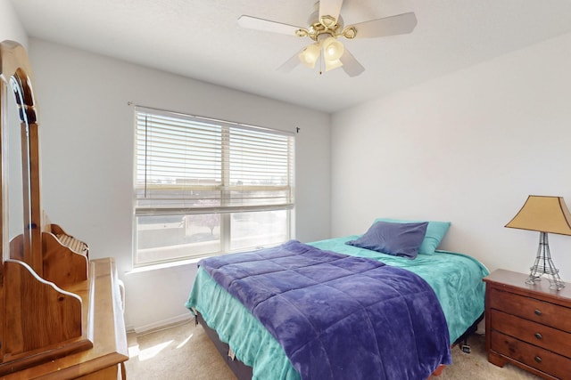 1001 Calle Garza NE, Albuquerque, NM 87113 - bedroom featuring baseboards, ceiling fan, and carpet flooring