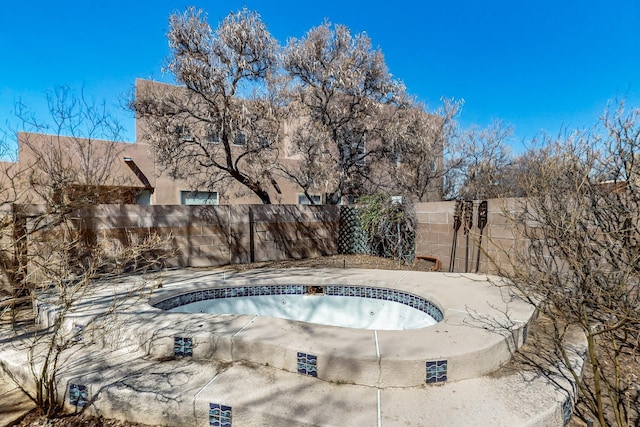 1001 Calle Garza NE, Albuquerque, NM 87113 - view of swimming pool featuring a patio area and a fenced backyard