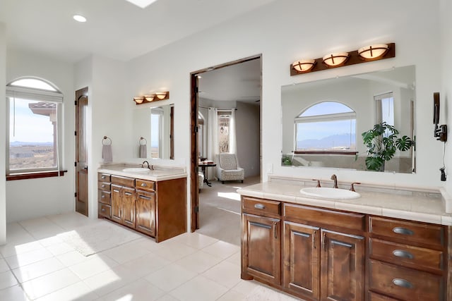 901 12th Ave SE, Rio Rancho, NM 87124 - full bath with two vanities and tile patterned flooring