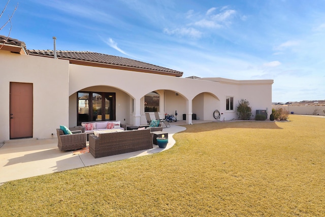 901 12th Ave SE, Rio Rancho, NM 87124 - rear view of property featuring an outdoor hangout area, stucco siding, and a patio area