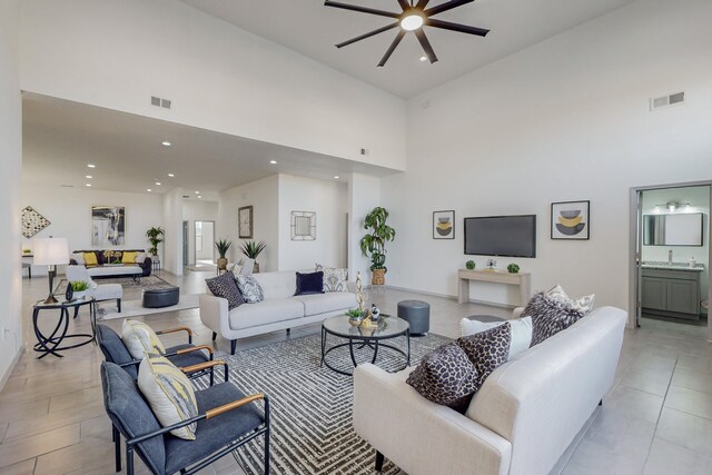 2006 Suttle Ct NE, Rio Rancho, NM 87124 - living area featuring visible vents, recessed lighting, a high ceiling, and a ceiling fan