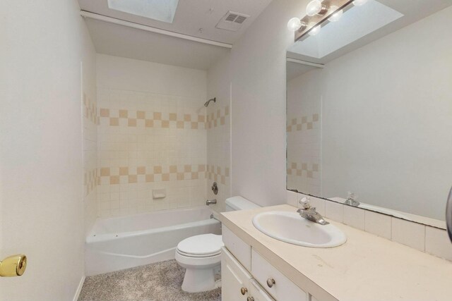 full bath with visible vents, toilet, vanity, and washtub / shower combination