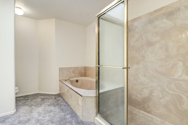full bath with a garden tub, toilet, baseboards, and a shower with shower door