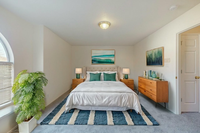 bedroom with light carpet