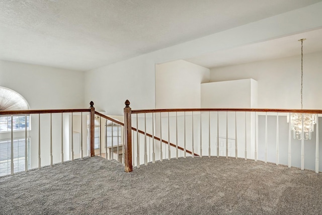 hallway featuring carpet flooring