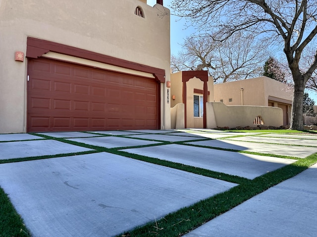 2638 Aloysia Ln NW, Albuquerque, NM 87104 - garage featuring driveway