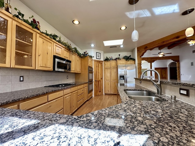 2638 Aloysia Ln NW, Albuquerque, NM 87104 - kitchen featuring tasteful backsplash, pendant lighting, stainless steel appliances, and a sink