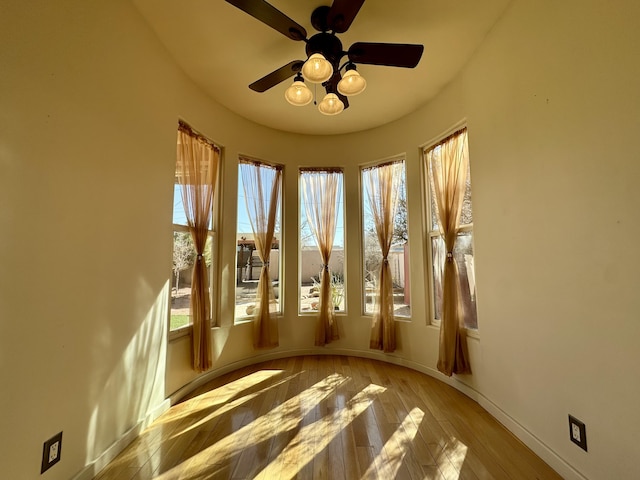 2638 Aloysia Ln NW, Albuquerque, NM 87104 - unfurnished room with a ceiling fan, baseboards, and wood-type flooring