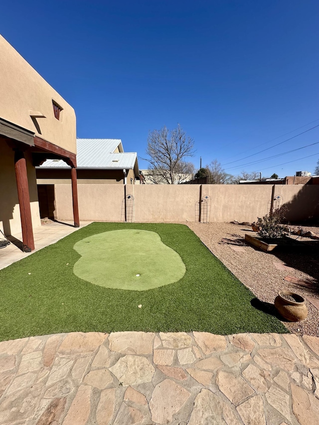 2638 Aloysia Ln NW, Albuquerque, NM 87104 - view of yard featuring a patio and a fenced backyard