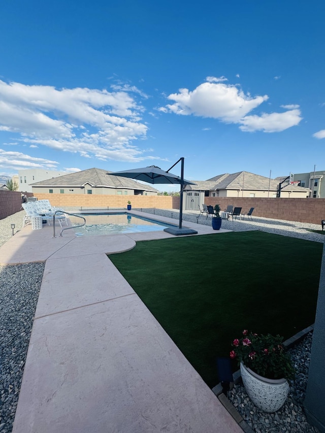 7754 Majesty Ct NW, Albuquerque, NM 87107 - fenced backyard featuring a patio, a residential view, and an outbuilding