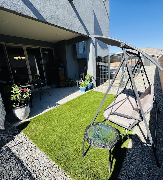 7754 Majesty Ct NW, Albuquerque, NM 87107 - view of grassy yard featuring a patio area